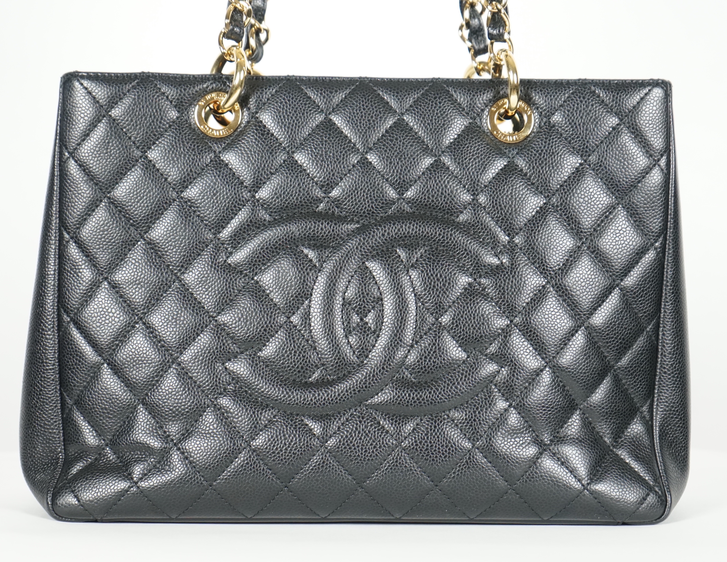 A Chanel vintage black quilted Caviar Timeless Grand Shopping Tote, width 34.5cm, height 25cm, height overall 47cm, depth 13cm, Please note this lot attracts an additional import tax of 20% on the hammer price